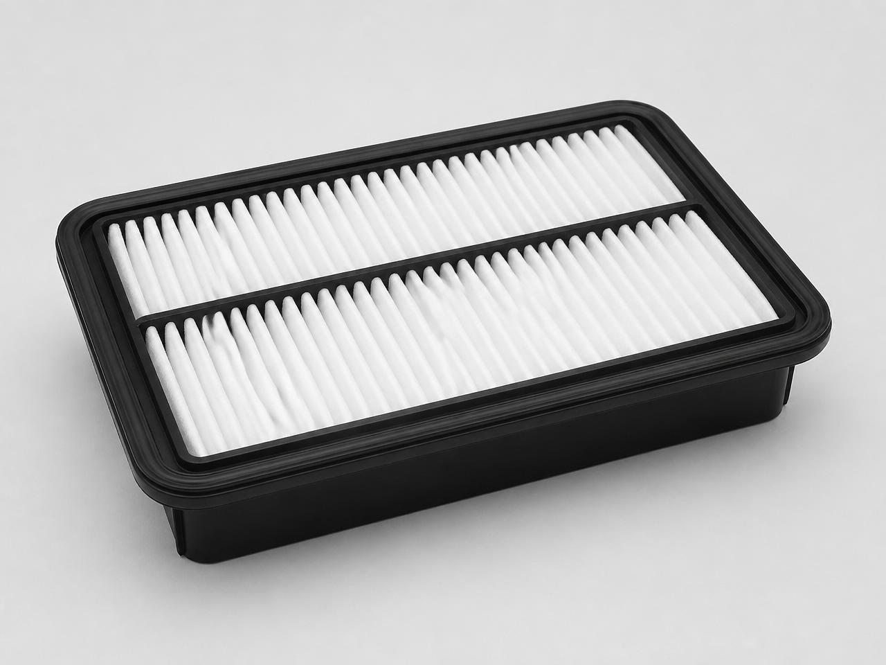 Rectangular automotive engine air filter with pleated media